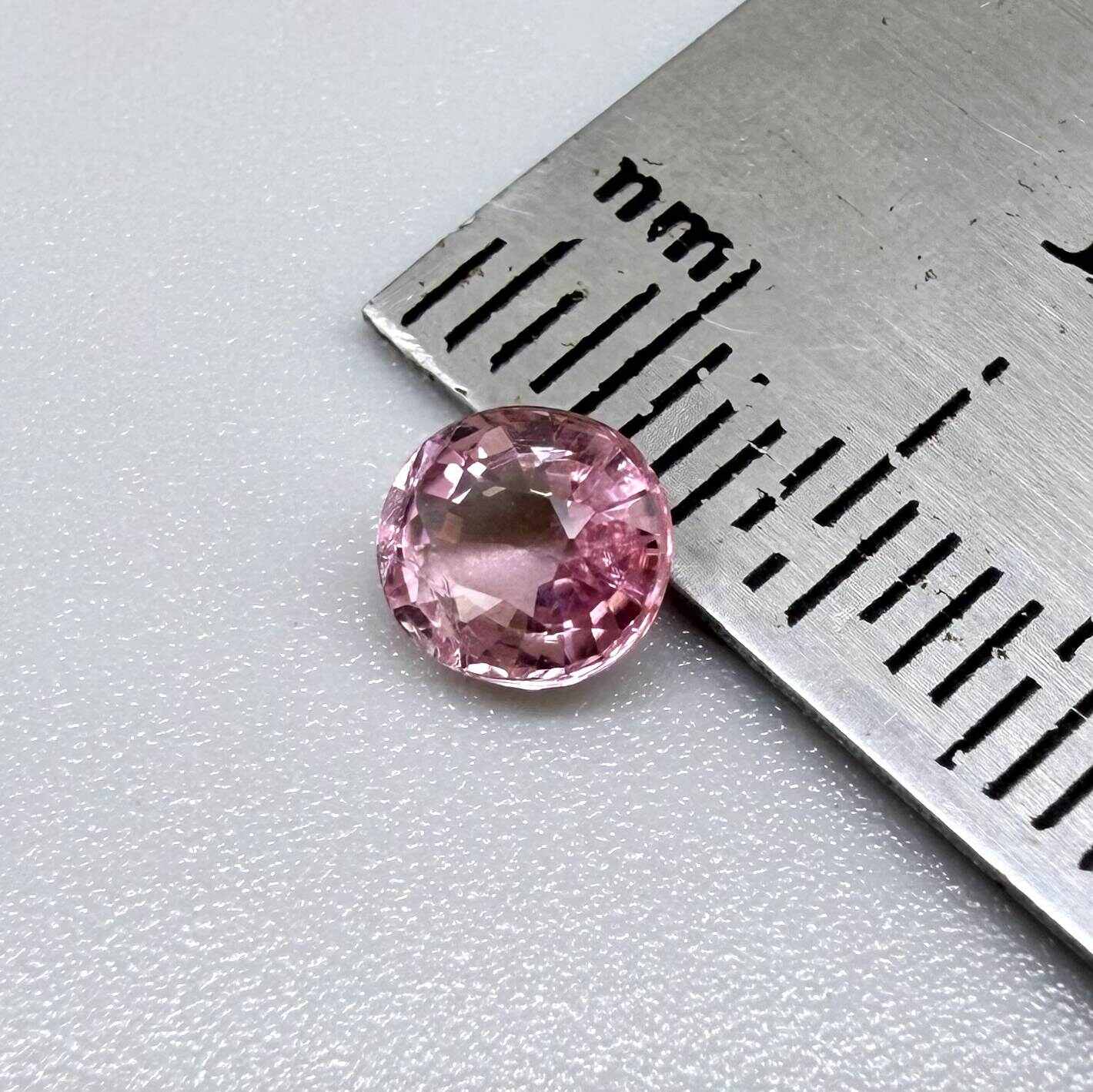 Natural untreated pink tourmaline, 0.67 ct oval cut from Nigeria with soft pink colour, eye-clean clarity and excellent brilliance.