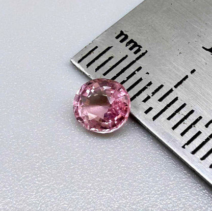Natural untreated pink tourmaline, 0.67 ct oval cut from Nigeria with soft pink colour, eye-clean clarity and excellent brilliance.