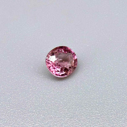 Natural untreated rich pink tourmaline, 0.73 ct round cut from Nigeria with rich pink colour, eye-clean clarity and lively brilliance