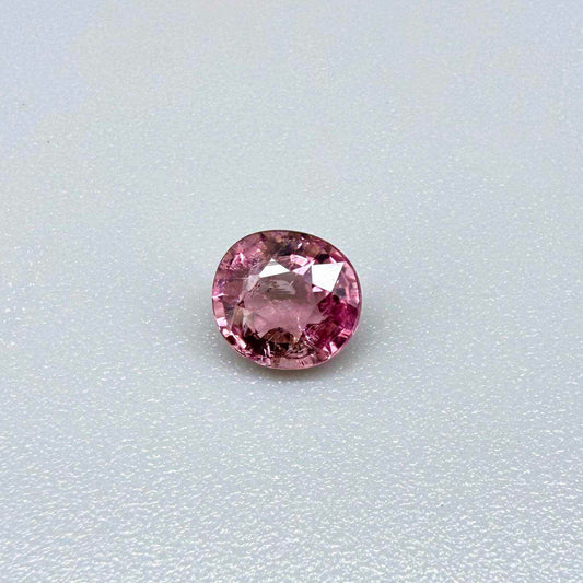 Natural untreated rich pink tourmaline, 0.73 ct round cut from Nigeria with rich pink colour, eye-clean clarity and lively brilliance