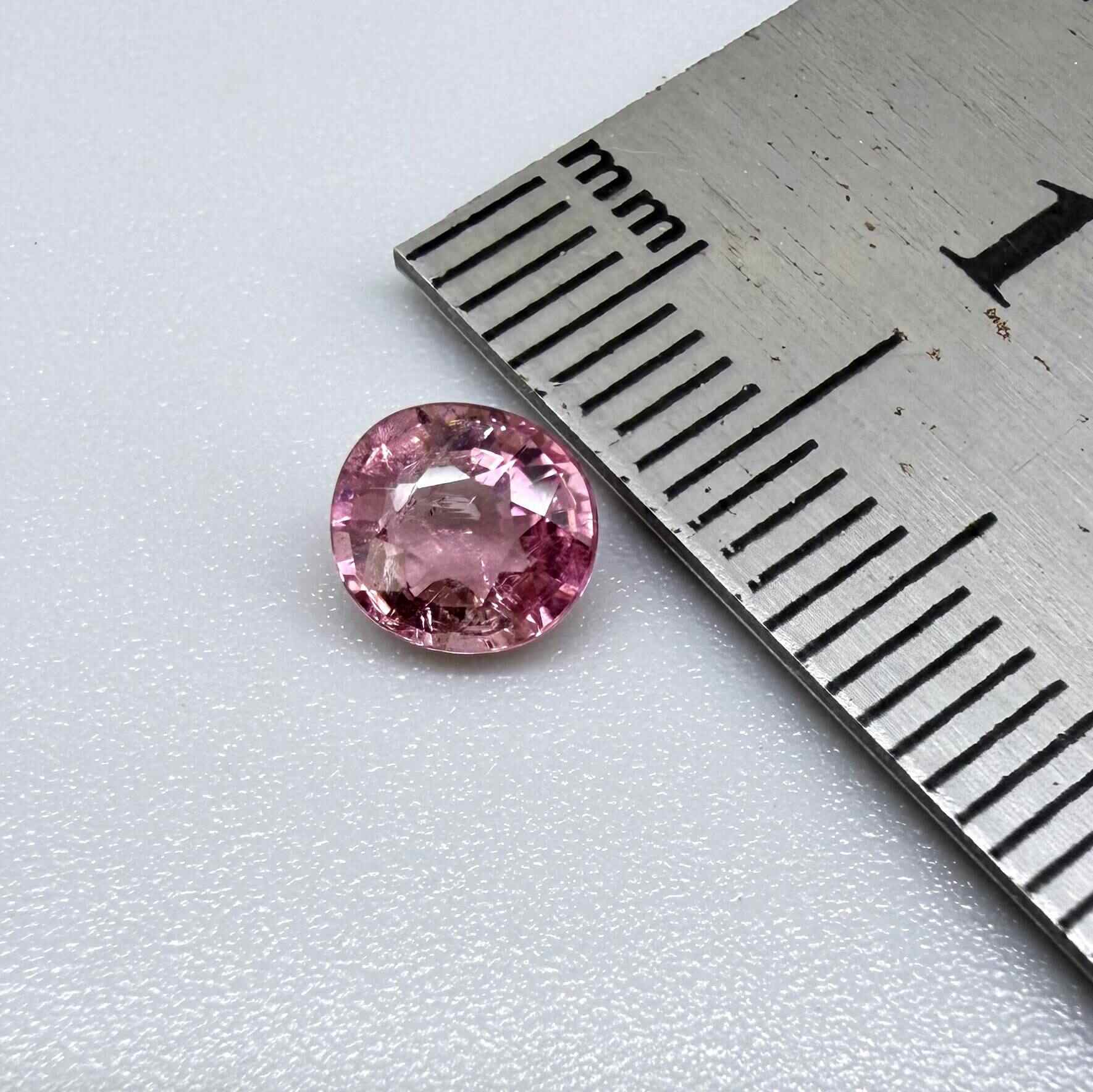Natural untreated rich pink tourmaline, 0.73 ct round cut from Nigeria with rich pink colour, eye-clean clarity and lively brilliance