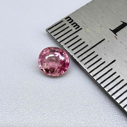 Natural untreated rich pink tourmaline, 0.73 ct round cut from Nigeria with rich pink colour, eye-clean clarity and lively brilliance