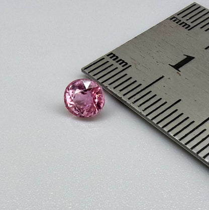 Natural untreated rich pink tourmaline, 0.89 ct oval cut from Nigeria with rich pink colour, eye-clean clarity and excellent brilliance.