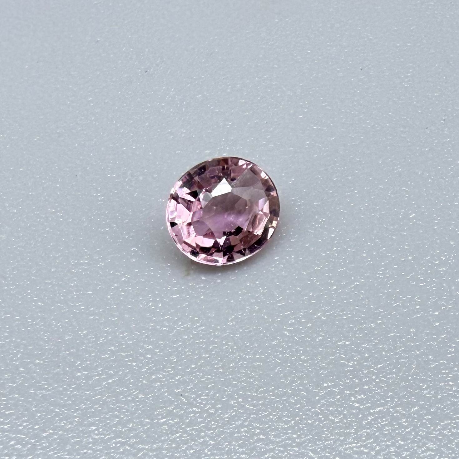 Natural untreated pink tourmaline, 0.31 ct round cut from Nigeria with soft pink colour and lively brilliance.