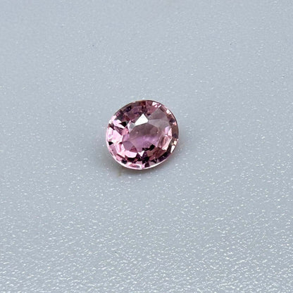 Natural untreated pink tourmaline, 0.31 ct round cut from Nigeria with soft pink colour and lively brilliance.