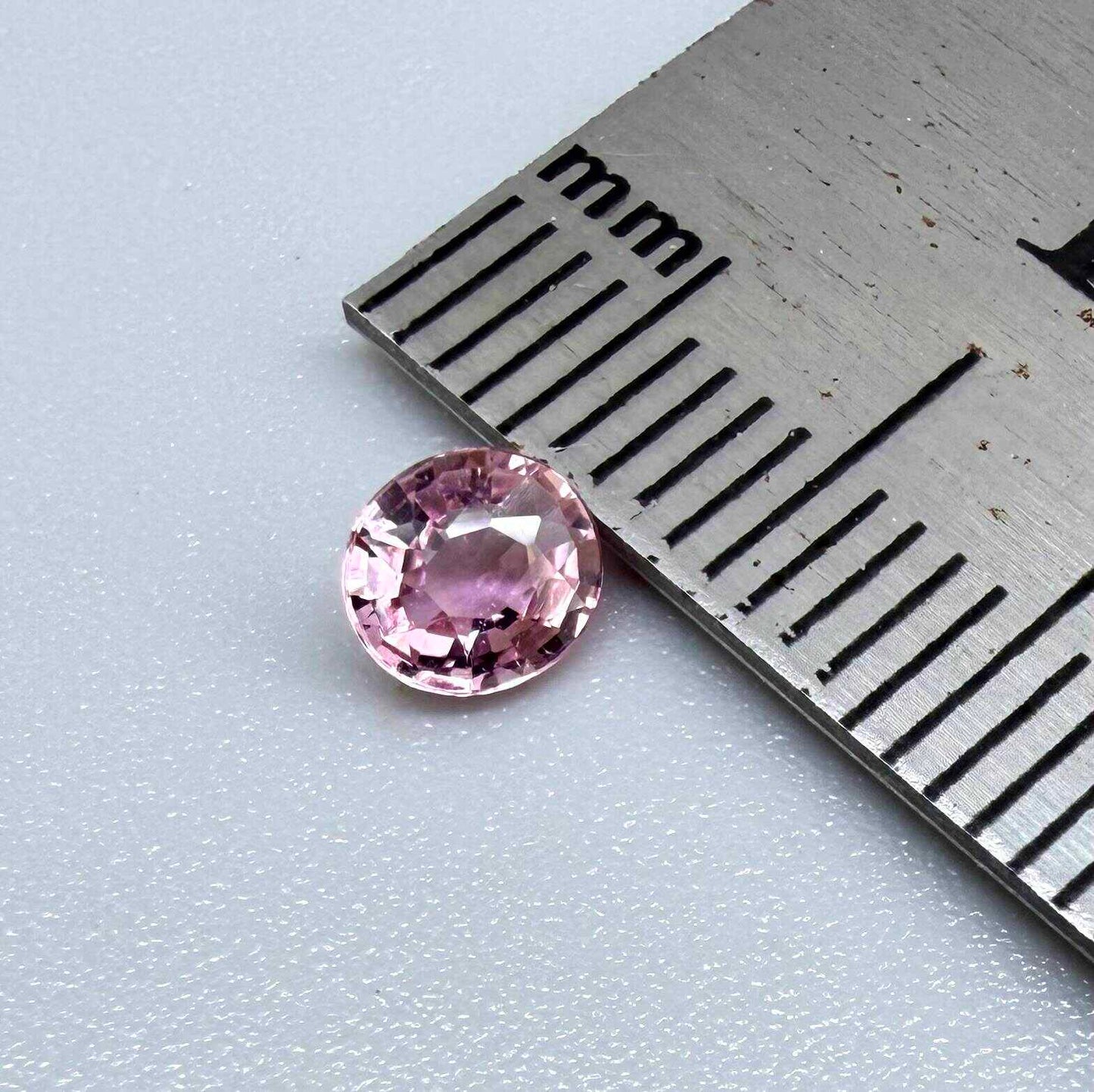 Natural untreated pink tourmaline, 0.31 ct round cut from Nigeria with soft pink colour and lively brilliance.