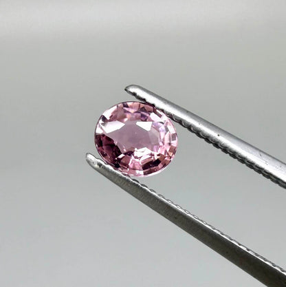 Natural untreated pink tourmaline, 0.31 ct round cut from Nigeria with soft pink colour and lively brilliance.