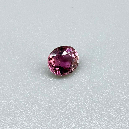 Natural untreated vivid magenta pink tourmaline, 0.66 ct oval cut from Nigeria with exceptional magenta pink colour, eye-clean clarity and outstanding brilliance.