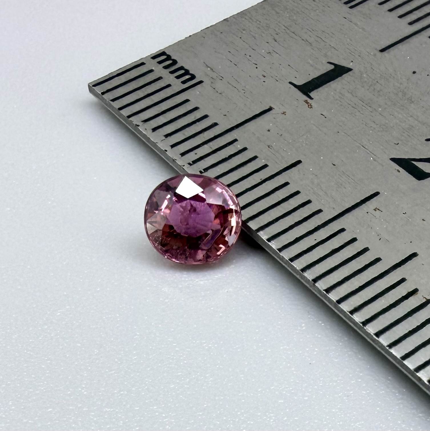 Natural untreated vivid magenta pink tourmaline, 0.66 ct oval cut from Nigeria with exceptional magenta pink colour, eye-clean clarity and outstanding brilliance.