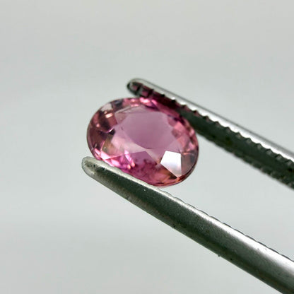 Natural untreated vivid magenta pink tourmaline, 0.66 ct oval cut from Nigeria with exceptional magenta pink colour, eye-clean clarity and outstanding brilliance.