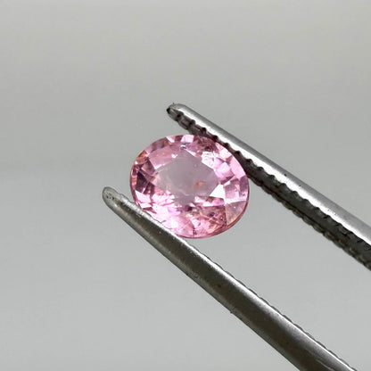 Natural untreated pink tourmaline, 0.52 ct oval cut from Nigeria with soft pink colour, eye-clean clarity and excellent brilliance.