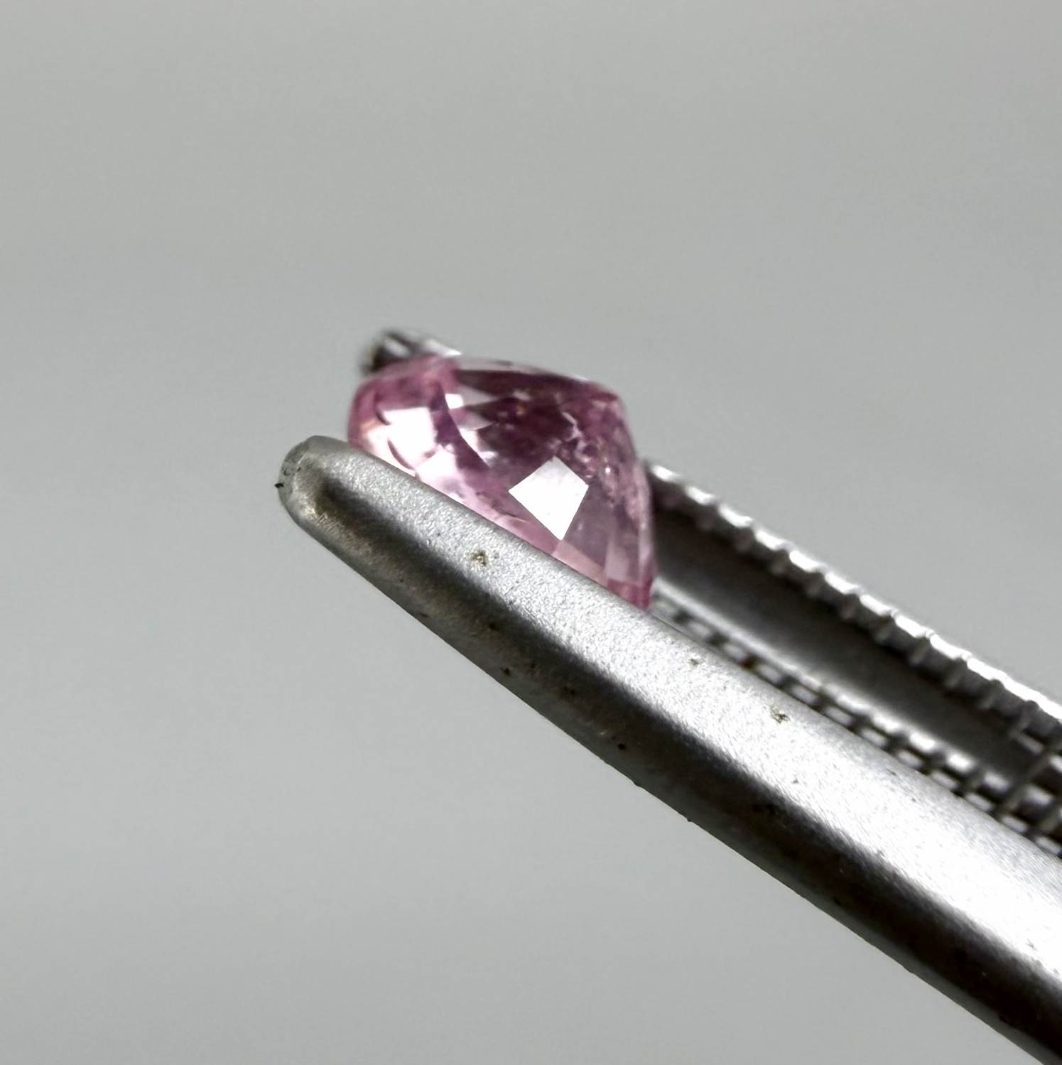 Natural untreated pink tourmaline, 0.52 ct oval cut from Nigeria with soft pink colour, eye-clean clarity and excellent brilliance.