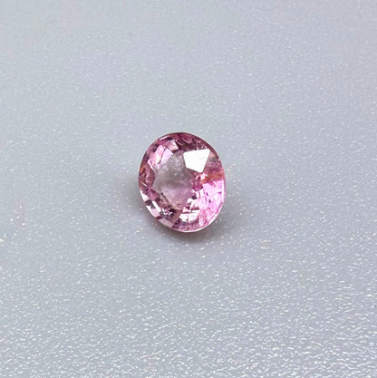 Natural untreated pink tourmaline, 0.52 ct oval cut from Nigeria with soft pink colour, eye-clean clarity and excellent brilliance.