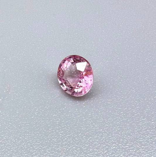Natural untreated pink tourmaline, 0.52 ct oval cut from Nigeria with soft pink colour, eye-clean clarity and excellent brilliance.