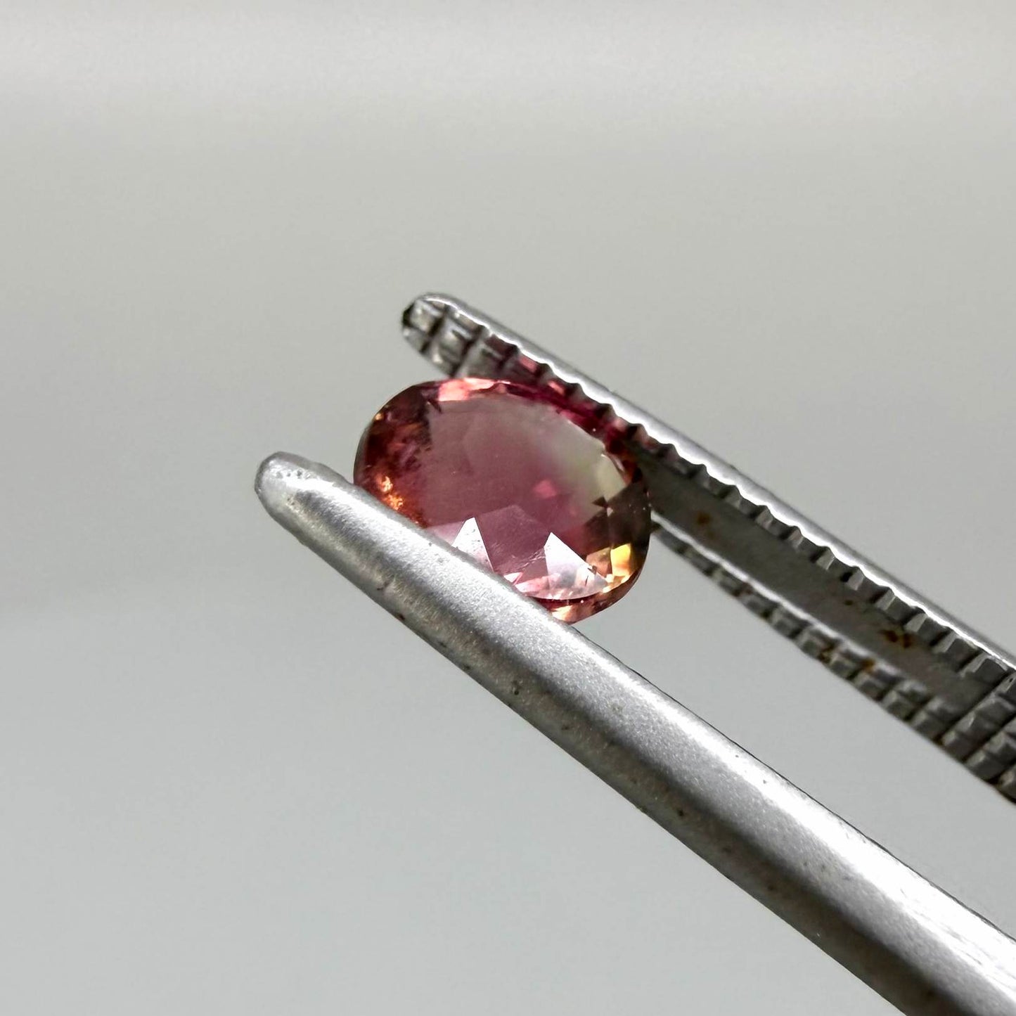Natural untreated cherry pink tourmaline, 0.52 ct cushion cut from Nigeria with rich cherry pink colour, eye-clean clarity and excellent brilliance.