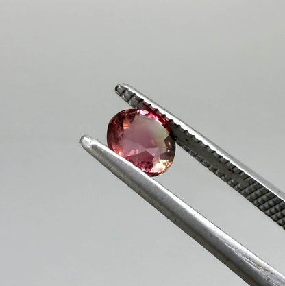 Natural untreated cherry pink tourmaline, 0.52 ct cushion cut from Nigeria with rich cherry pink colour, eye-clean clarity and excellent brilliance.