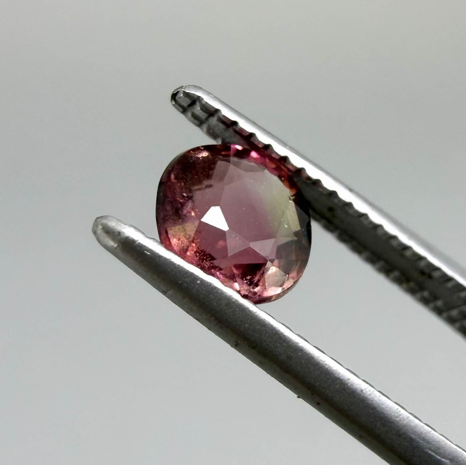Natural untreated cherry pink tourmaline, 0.52 ct cushion cut from Nigeria with rich cherry pink colour, eye-clean clarity and excellent brilliance.