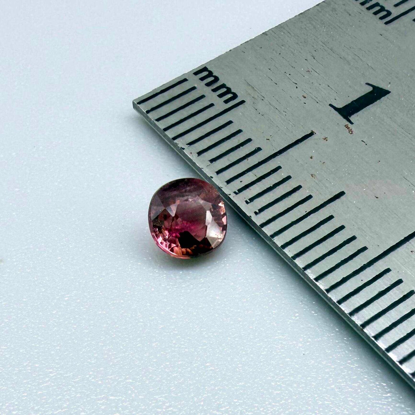 Natural untreated cherry pink tourmaline, 0.52 ct cushion cut from Nigeria with rich cherry pink colour, eye-clean clarity and excellent brilliance.