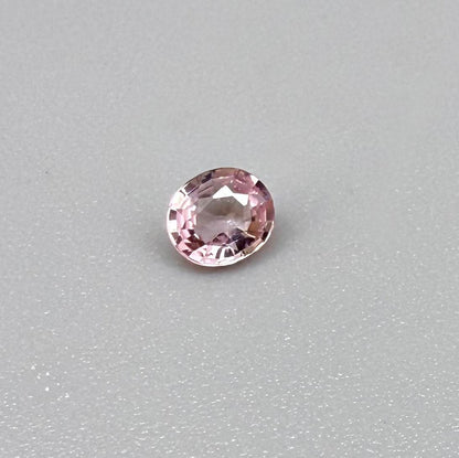 Natural untreated pink tourmaline, 0.37 ct oval cut from Nigeria with soft pink colour, eye-clean clarity and excellent brilliance.