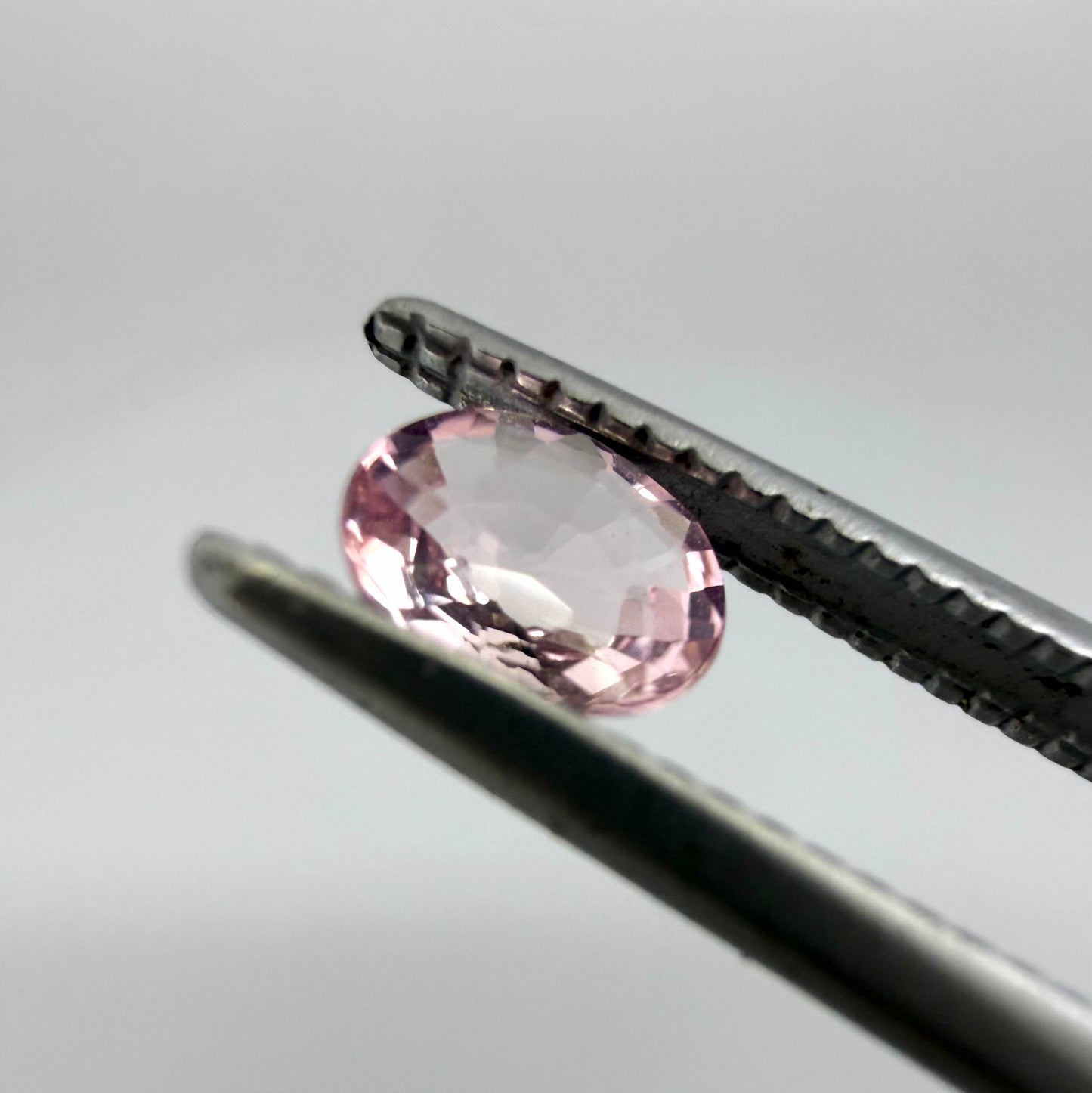 Natural untreated pink tourmaline, 0.37 ct oval cut from Nigeria with soft pink colour, eye-clean clarity and excellent brilliance.
