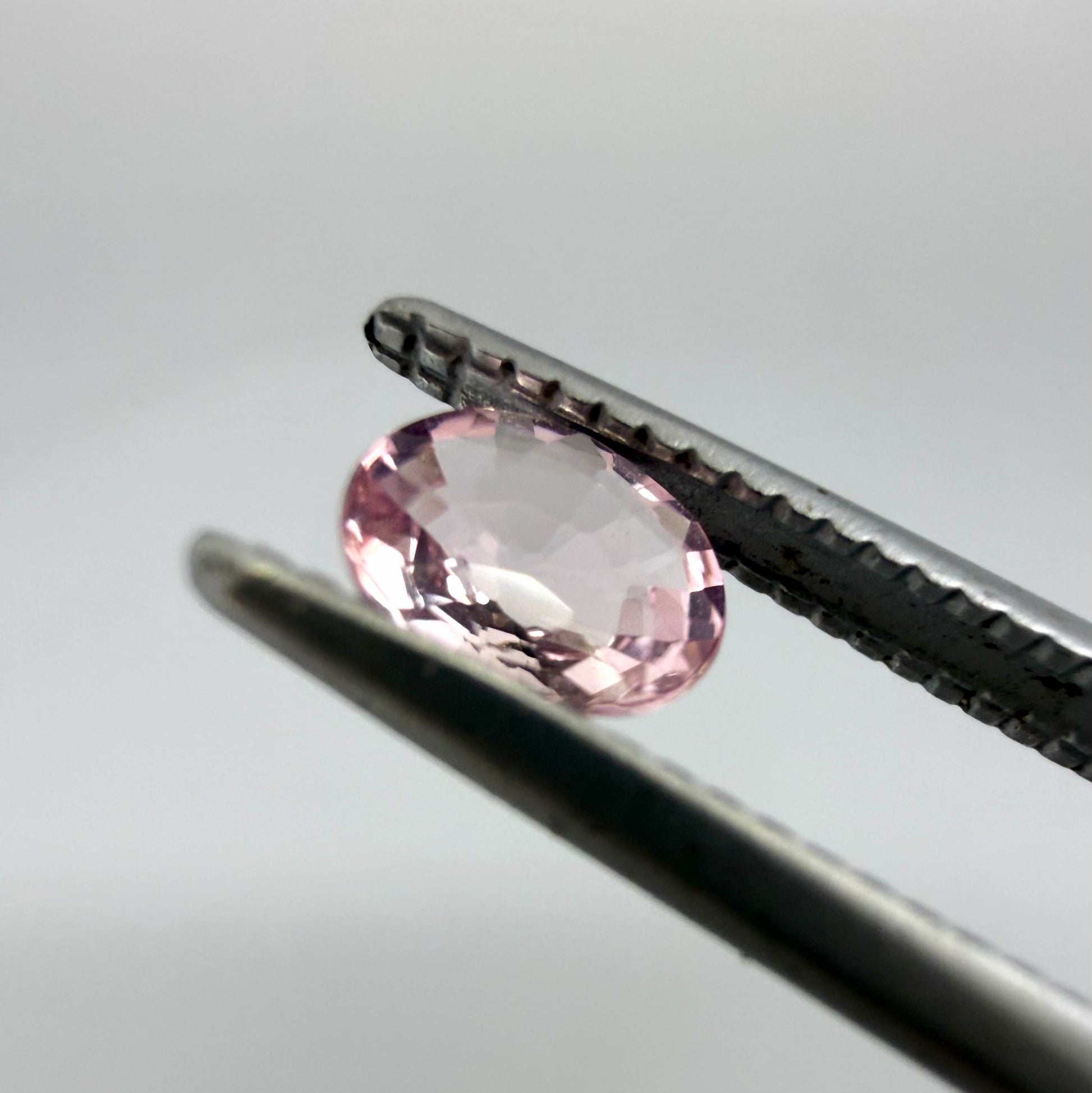 Natural untreated pink tourmaline, 0.37 ct oval cut from Nigeria with soft pink colour, eye-clean clarity and excellent brilliance.