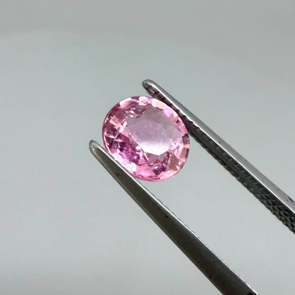 Natural untreated rich pink tourmaline, 0.76 ct oval cut from Nigeria with rich pink colour, lively brilliance and slight natural inclusions.
