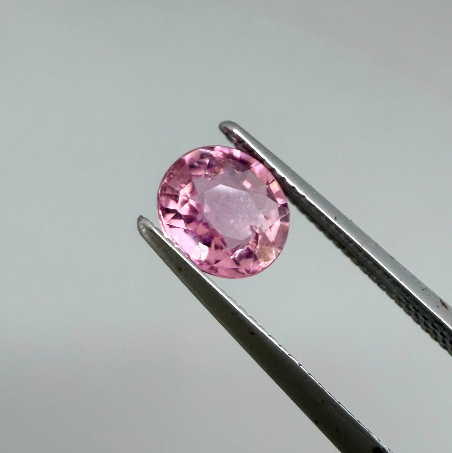Natural untreated rich pink tourmaline, 0.76 ct oval cut from Nigeria with rich pink colour, lively brilliance and slight natural inclusions.