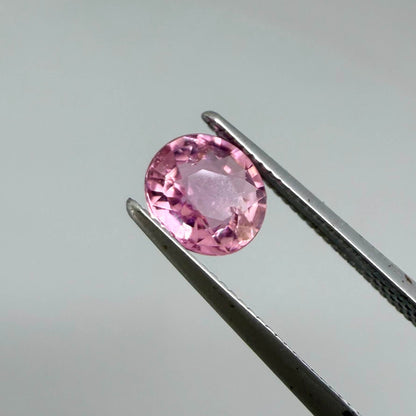 Natural untreated rich pink tourmaline, 0.76 ct oval cut from Nigeria with rich pink colour, lively brilliance and slight natural inclusions.