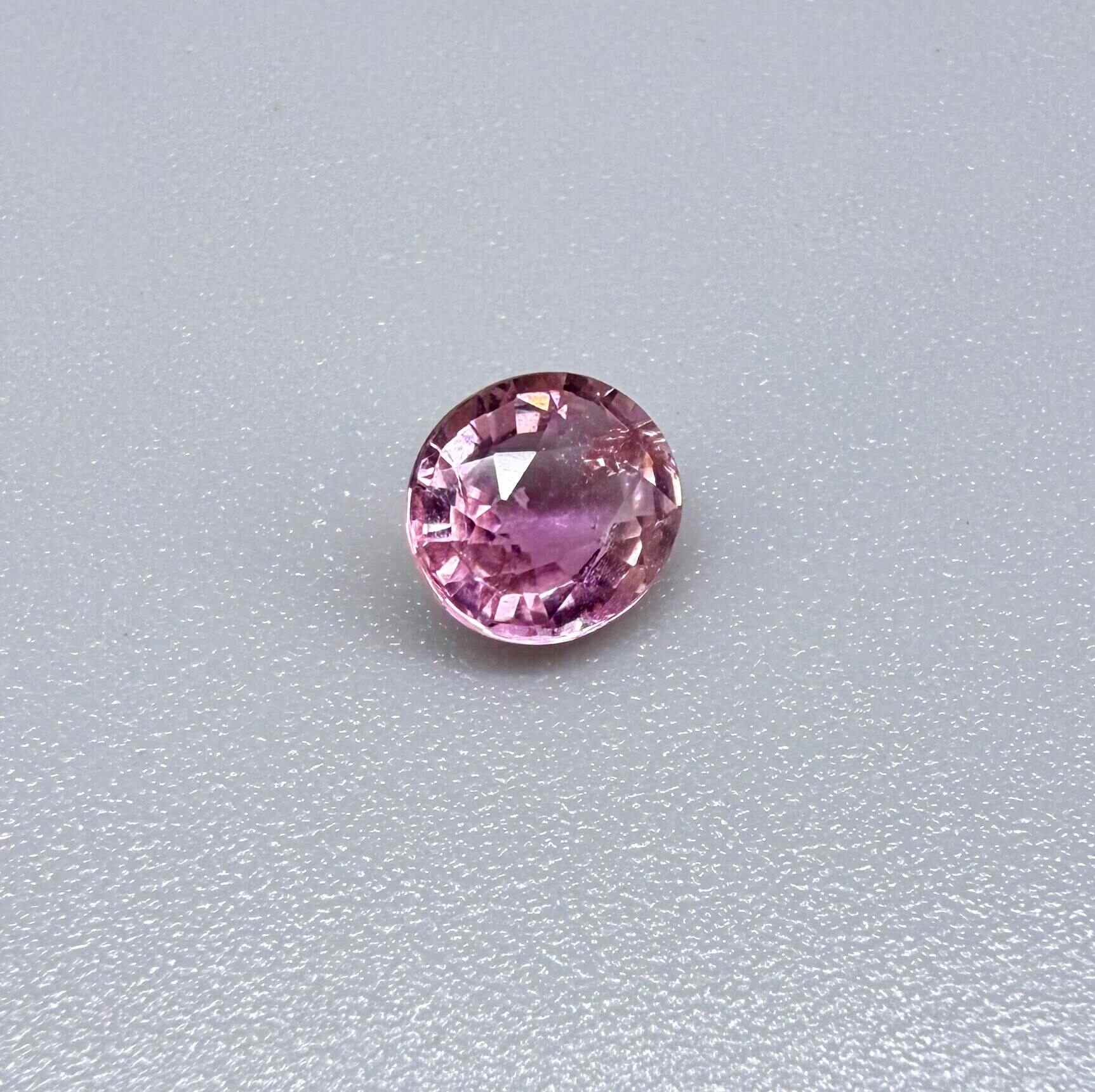 Natural untreated rich pink tourmaline, 0.76 ct oval cut from Nigeria with rich pink colour, lively brilliance and slight natural inclusions.