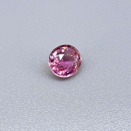 Natural untreated rich pink tourmaline, 0.76 ct oval cut from Nigeria with rich pink colour, lively brilliance and slight natural inclusions.