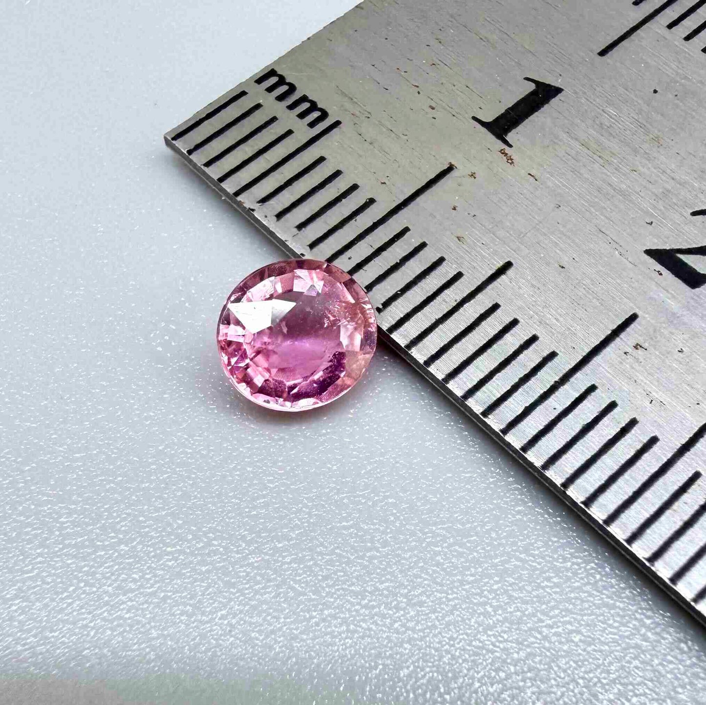 Natural untreated rich pink tourmaline, 0.76 ct oval cut from Nigeria with rich pink colour, lively brilliance and slight natural inclusions.