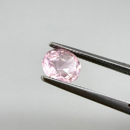 Natural untreated pink tourmaline, 0.75 ct oval cut from Nigeria with soft pink colour, eye-clean clarity and excellent brilliance.