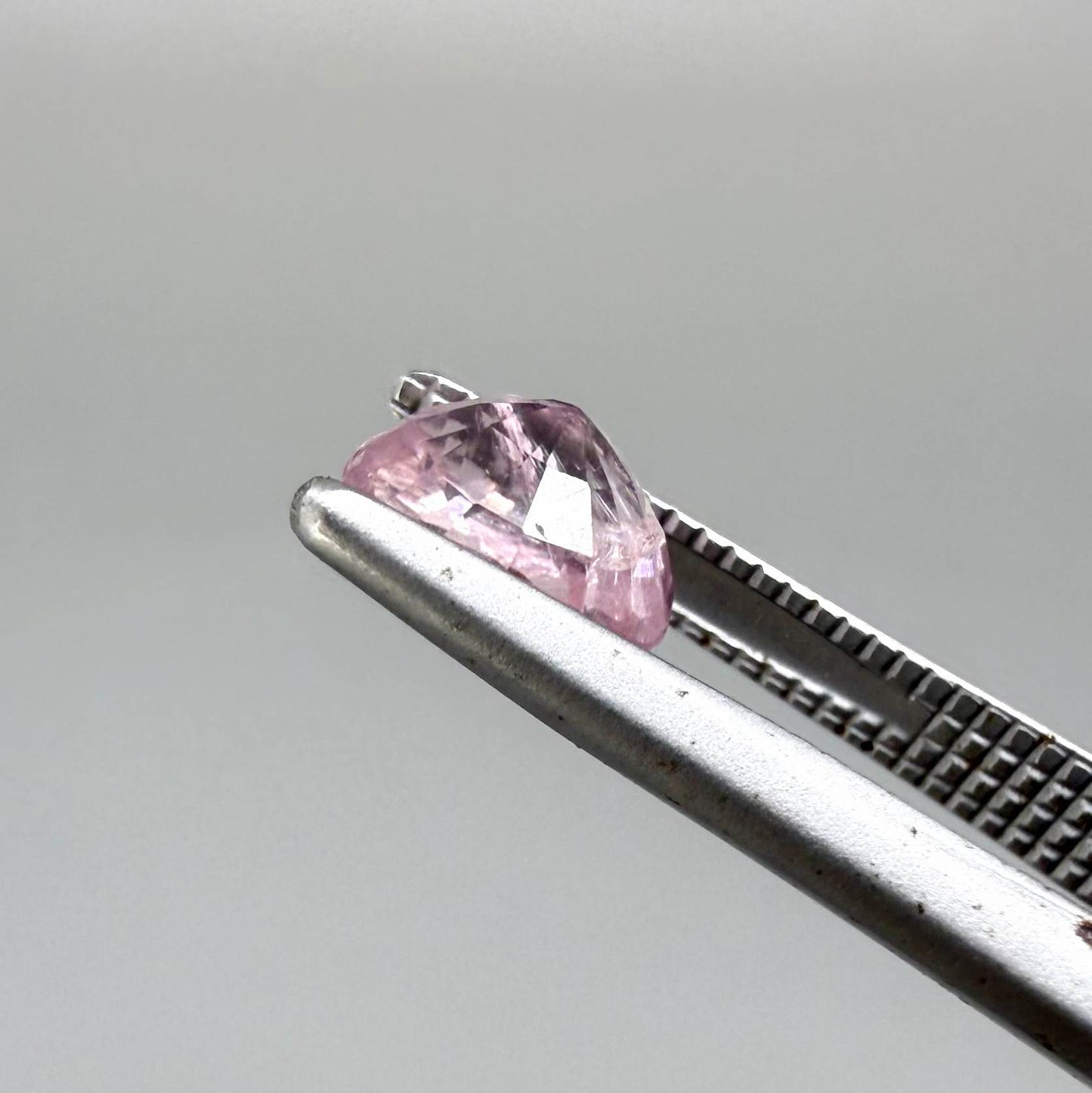Natural untreated pink tourmaline, 0.75 ct oval cut from Nigeria with soft pink colour, eye-clean clarity and excellent brilliance.