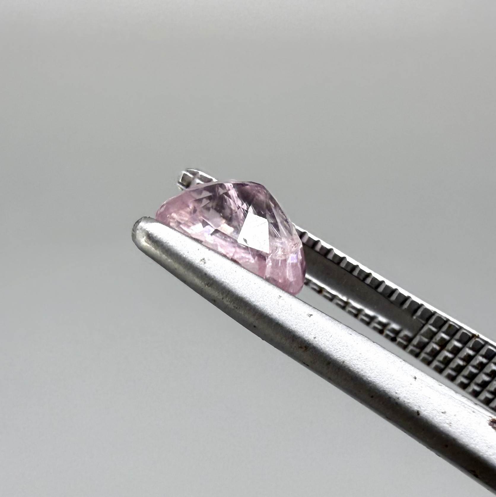 Natural untreated pink tourmaline, 0.75 ct oval cut from Nigeria with soft pink colour, eye-clean clarity and excellent brilliance.