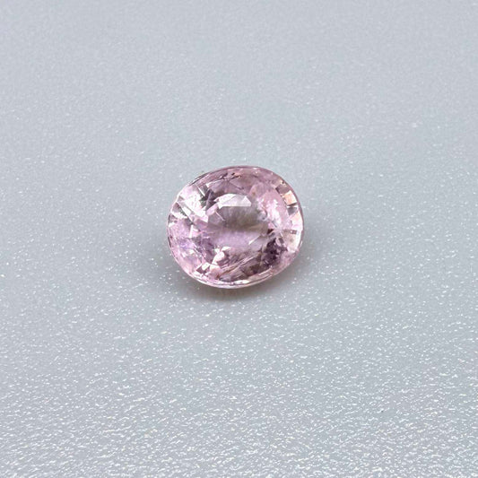 Natural untreated pink tourmaline, 0.75 ct oval cut from Nigeria with soft pink colour, eye-clean clarity and excellent brilliance.