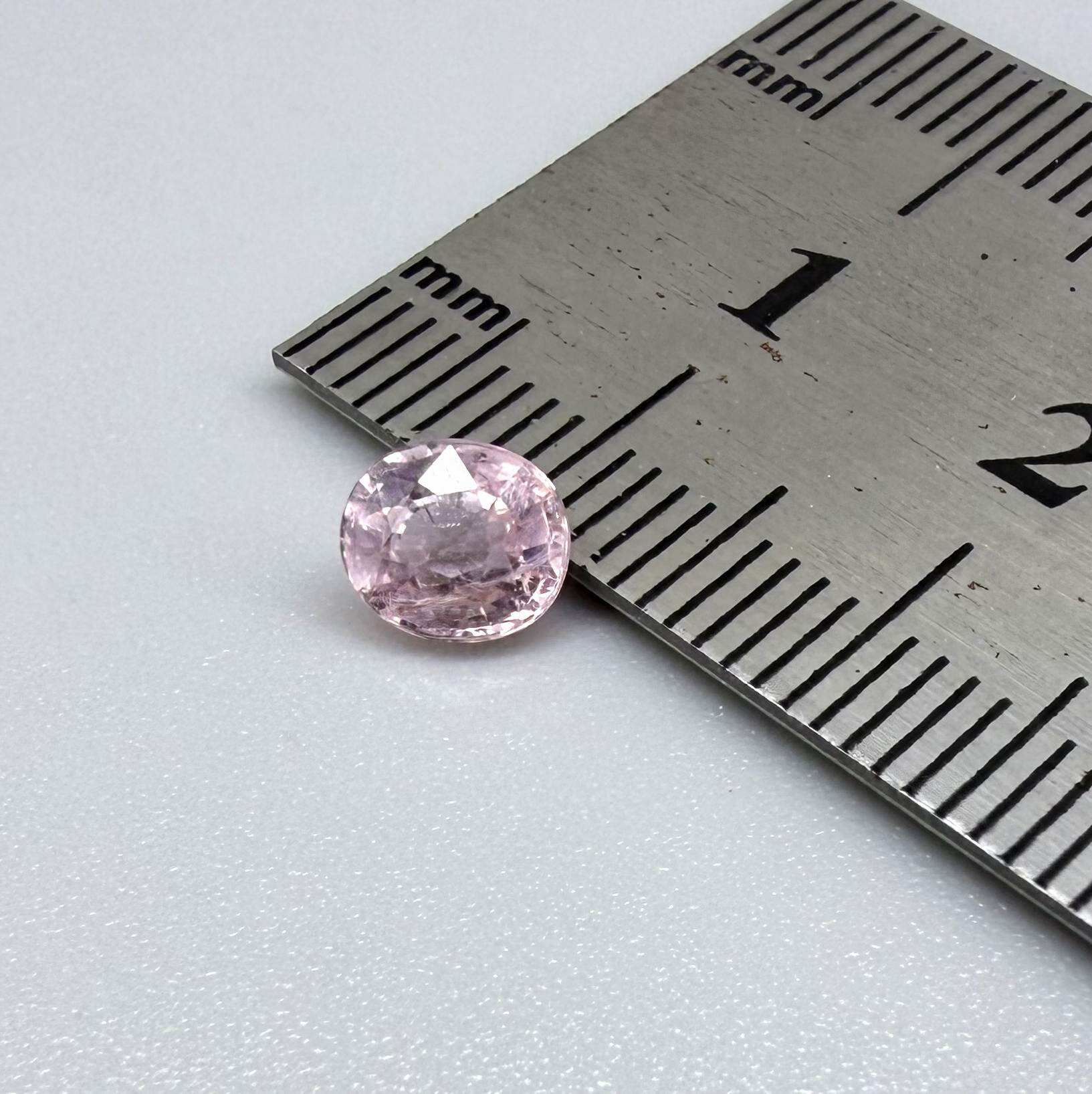 Natural untreated pink tourmaline, 0.75 ct oval cut from Nigeria with soft pink colour, eye-clean clarity and excellent brilliance.