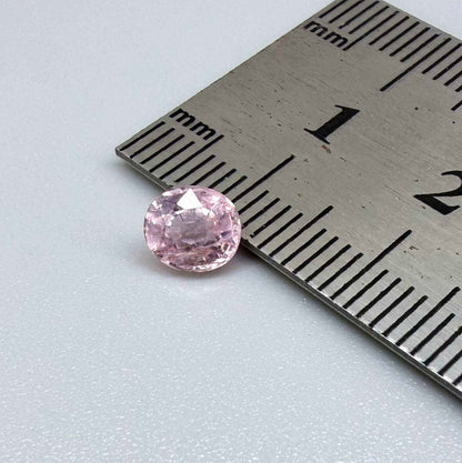 Natural untreated pink tourmaline, 0.75 ct oval cut from Nigeria with soft pink colour, eye-clean clarity and excellent brilliance.