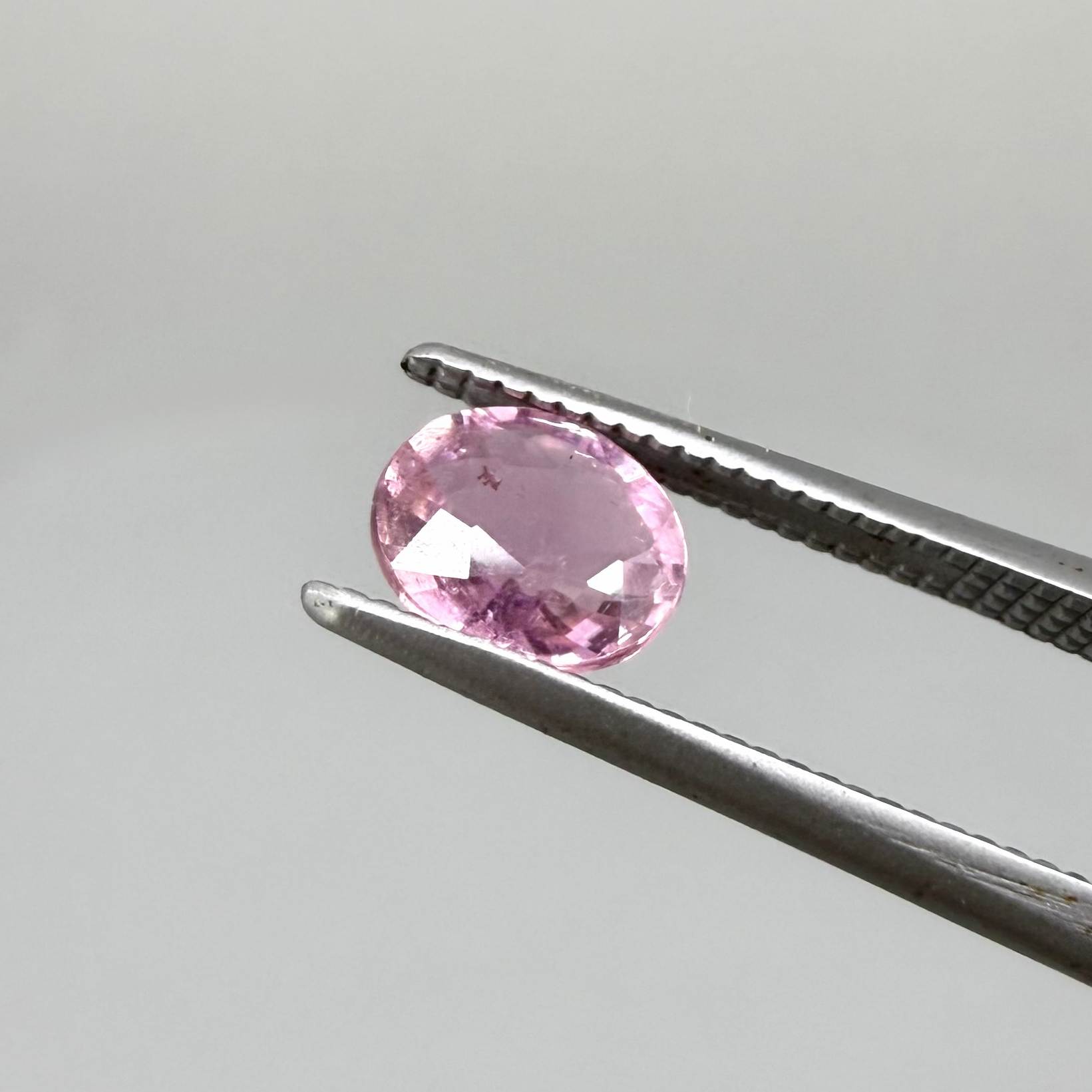 Natural untreated pink tourmaline, 0.61 ct oval cut from Nigeria with soft pink colour, lively brilliance and slight natural inclusions.