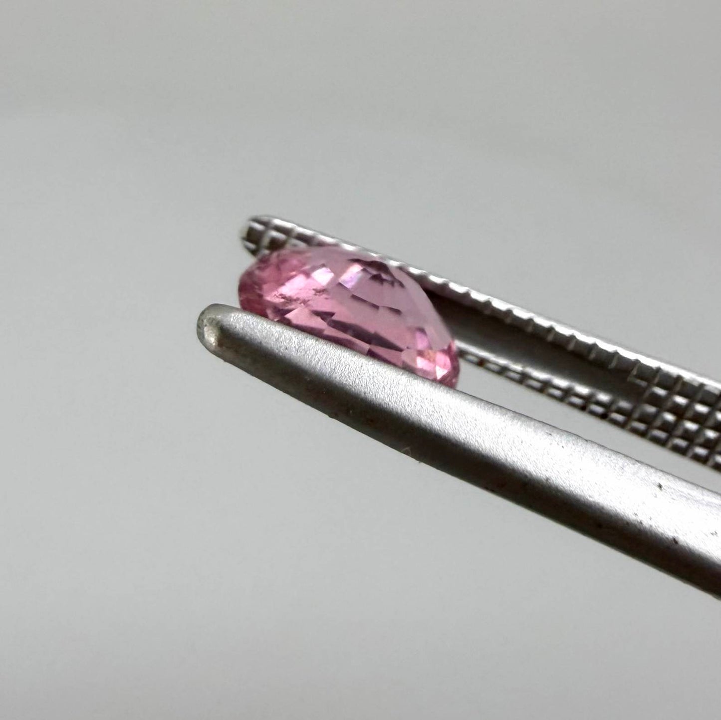 Natural untreated pink tourmaline, 0.61 ct oval cut from Nigeria with soft pink colour, lively brilliance and slight natural inclusions.