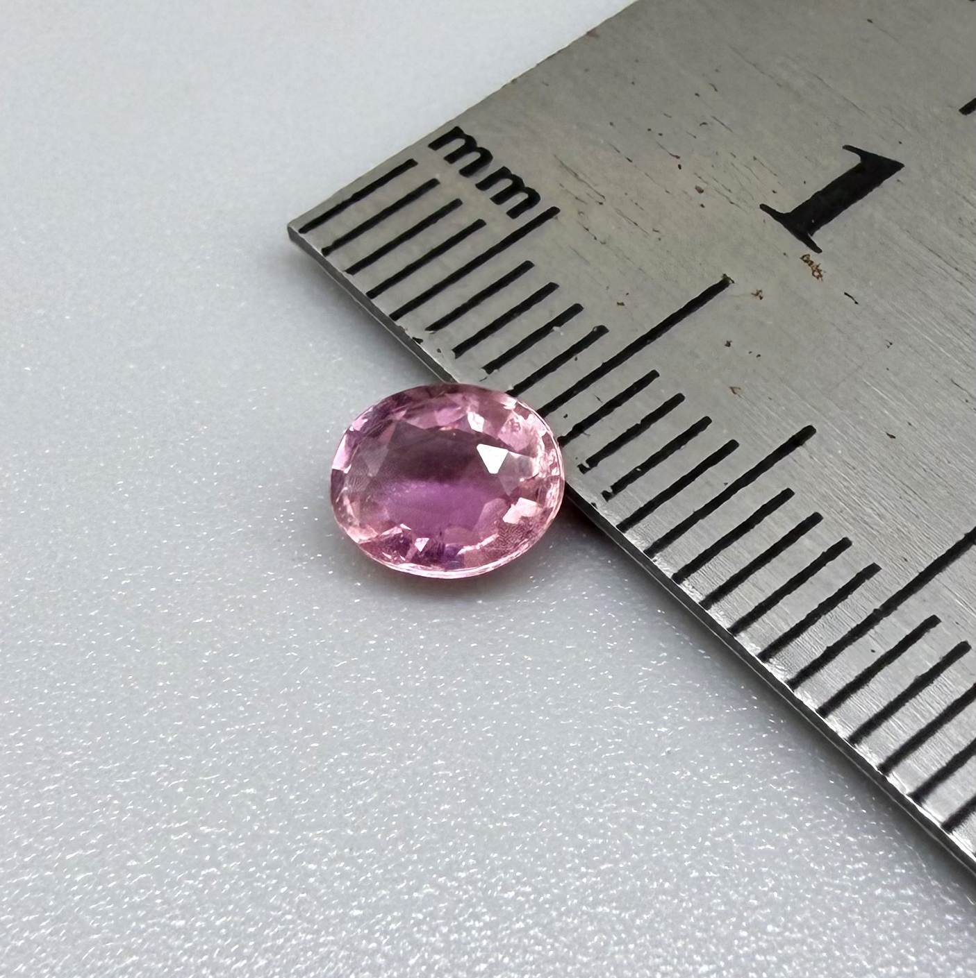 Natural untreated pink tourmaline, 0.61 ct oval cut from Nigeria with soft pink colour, lively brilliance and slight natural inclusions.