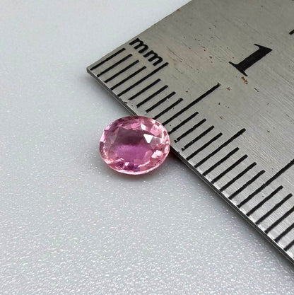 Natural untreated pink tourmaline, 0.61 ct oval cut from Nigeria with soft pink colour, lively brilliance and slight natural inclusions.