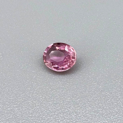 Natural untreated pink tourmaline, 0.61 ct oval cut from Nigeria with soft pink colour, lively brilliance and slight natural inclusions.