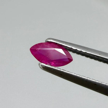 Faceted marquise-cut pink rubies with a total weight of 0.33 ct, eye-clean to slightly silky appearance with natural inclusions