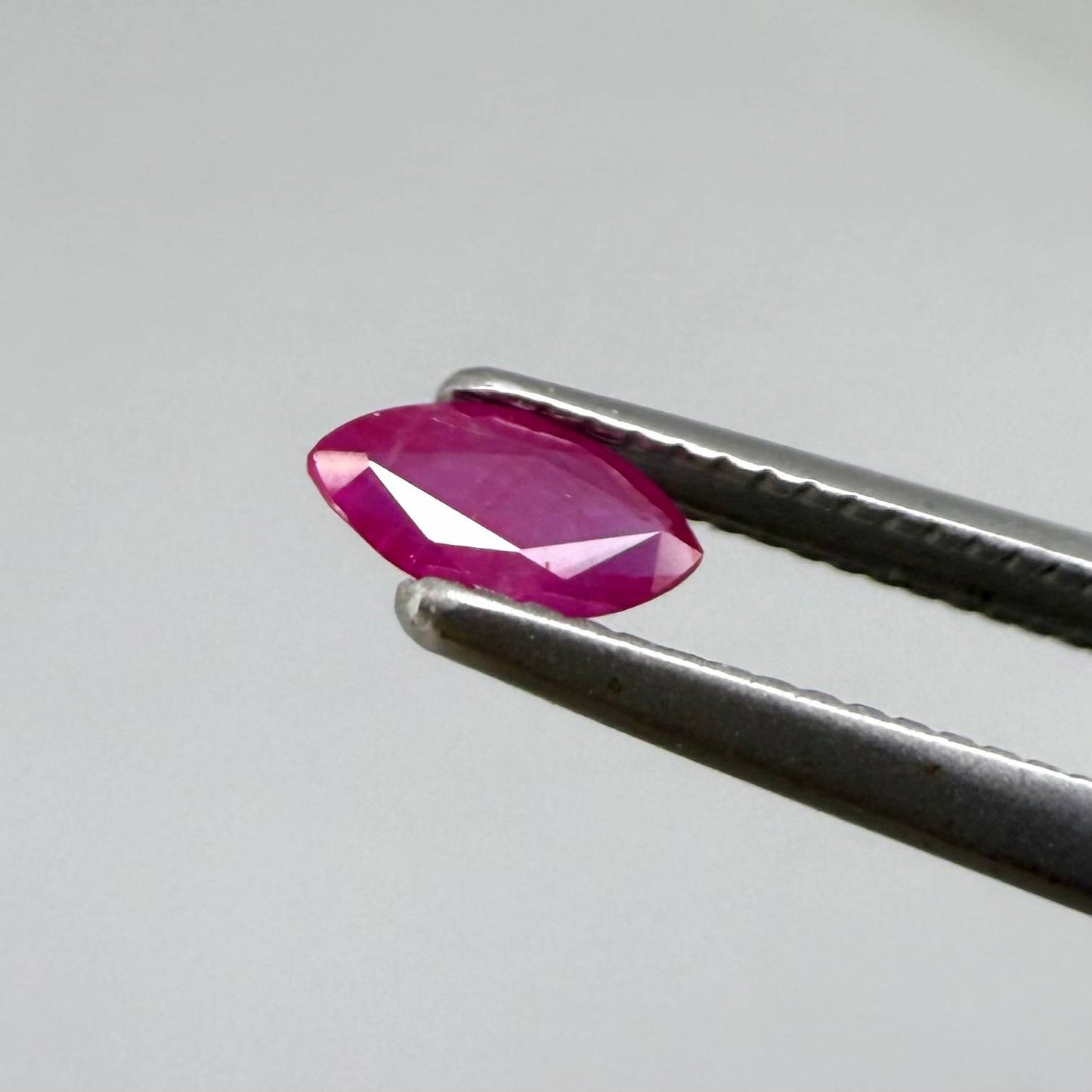 Faceted marquise-cut pink rubies with a total weight of 0.33 ct, eye-clean to slightly silky appearance with natural inclusions