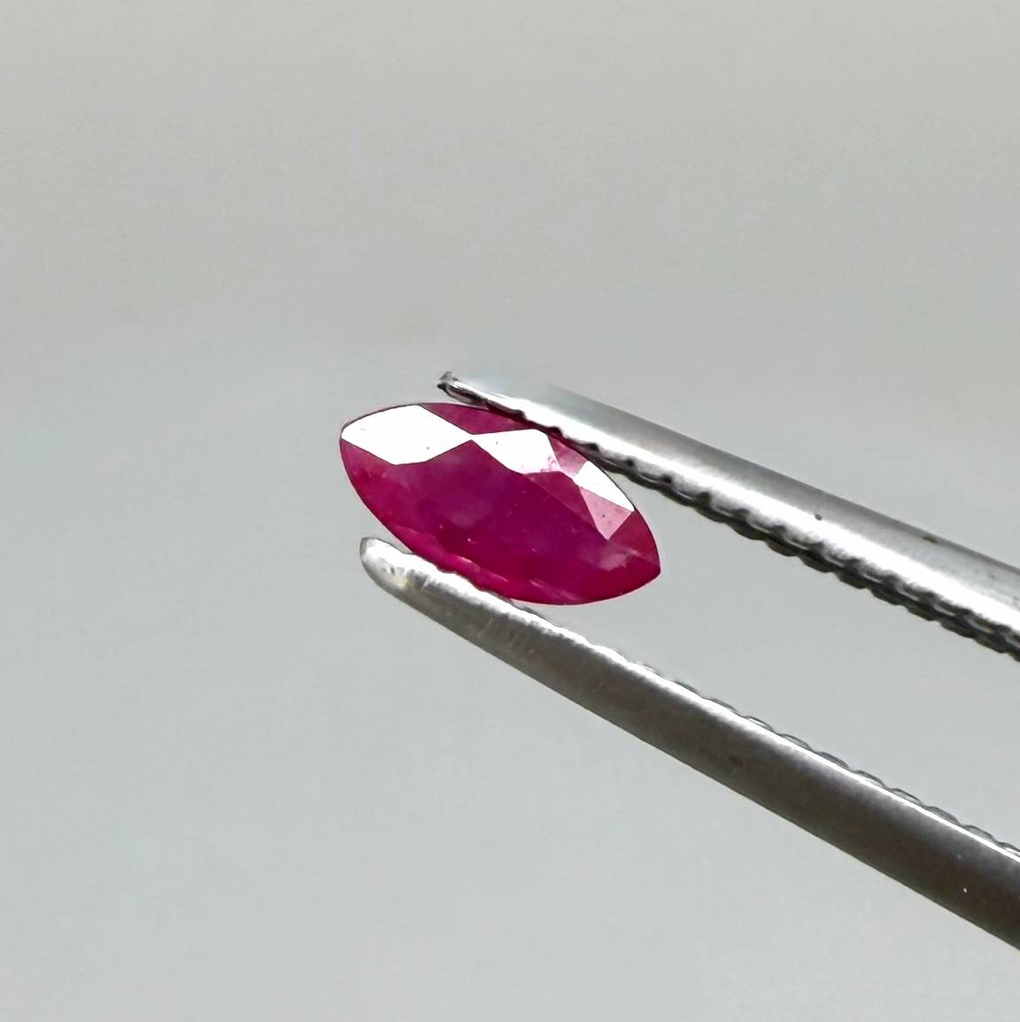 Faceted marquise-cut pink rubies with a total weight of 0.33 ct, eye-clean to slightly silky appearance with natural inclusions
