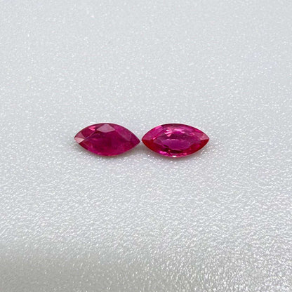 Two pink-red marquise-cut rubies with a total of 0.34 ct, eye-clean appearance with fine natural inclusions