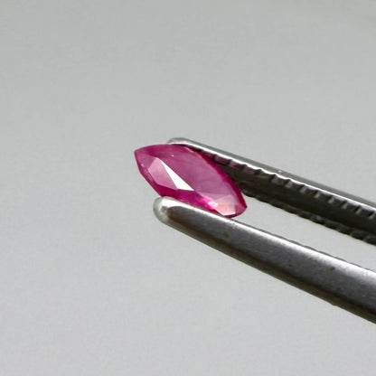 Two pink-red marquise-cut rubies with a total of 0.34 ct, eye-clean appearance with fine natural inclusions