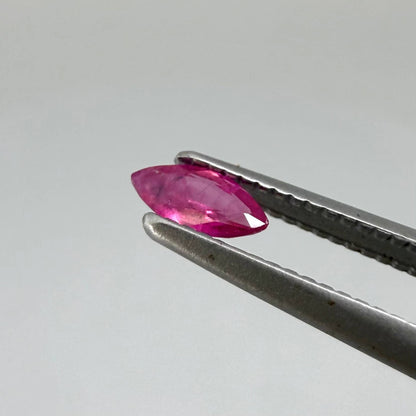 Two reddish-pink marquise-cut rubies, with a total of 0.33 ct, eye-clean appearance with fine natural inclusions