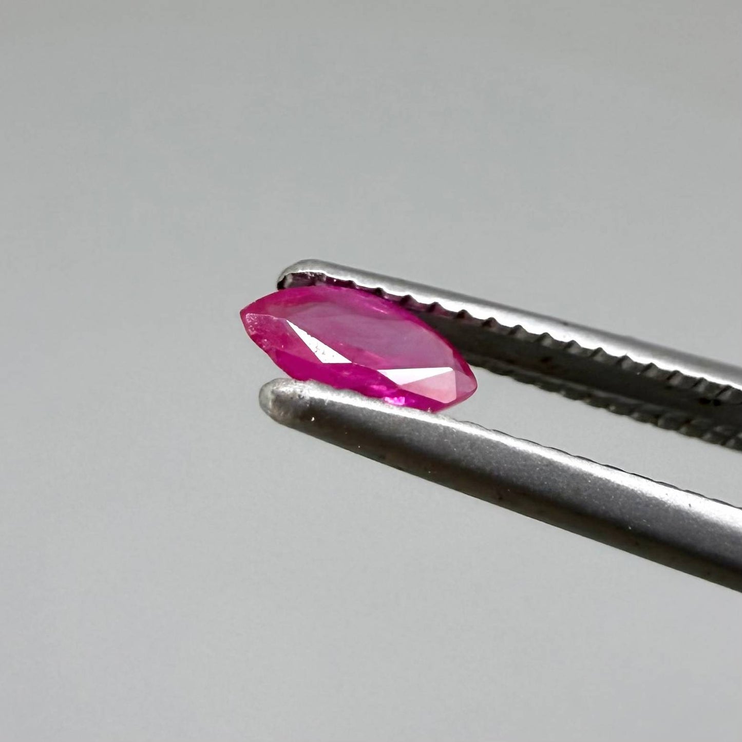 Three marquise-cut pink-red ruby, eye-clean to slightly silky appearance with fine inclusions