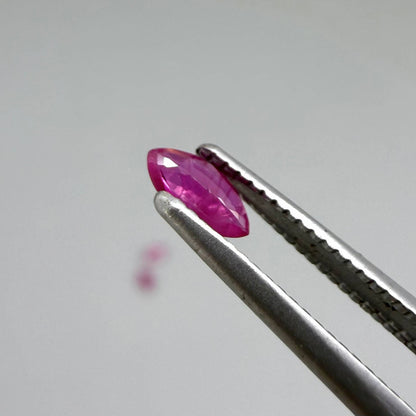 Three marquise-cut pink-red ruby, eye-clean to slightly silky appearance with fine inclusions